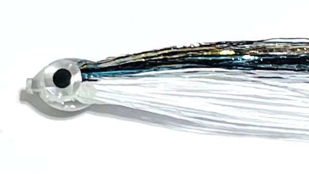 Close-up of the CHP/Black Rainbow/White fishing lure featuring a white plastic head and long, shiny strands in black, gold, and white on a white background.