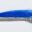 Close-up of a blue and silver synthetic fishing lure.